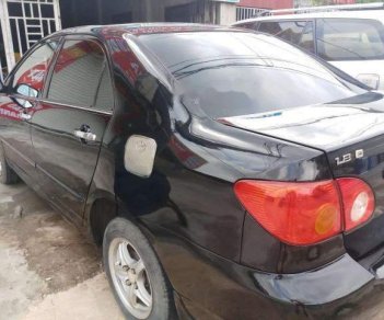 Toyota Corolla altis   2003 - Cần bán Toyota Corolla altis sản xuất năm 2003, màu đen, nhập khẩu