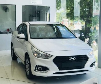 Hyundai Accent 1.4MT 2018 - Cần bán xe Hyundai Accent 1.4MT đời 2018, màu trắng, giá chỉ 424.99 triệu