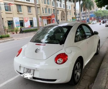 Volkswagen New Beetle 1.6 AT 2009 - Chính chủ bán Volkswagen New Beetle 1.6 AT, năm 2010, màu trắng, xe nhập