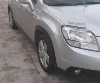 Chevrolet Orlando 2012 - Cần bán xe Chevrolet Orlando năm 2012, màu bạc, giá chỉ 410 triệu