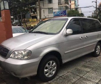 Kia Carnival 2009 - Bán Kia Carnival đời 2009, màu bạc xe gia đình