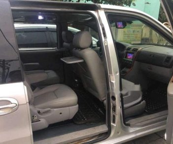 Kia Carnival 2009 - Bán Kia Carnival đời 2009, màu bạc xe gia đình