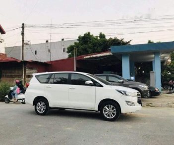 Toyota Innova 2017 - Cần bán gấp Toyota Innova sản xuất năm 2017, màu trắng, 710 triệu