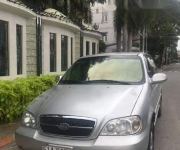 Kia Carnival 2009 - Bán Kia Carnival đời 2009, màu bạc xe gia đình