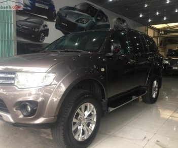 Mitsubishi Pajero Sport D 4x2 MT 2014 - Bán Mitsubushi Pajero Sport đời 2014 màu nâu, số sàn, động cơ 2.5, chạy 50.000km