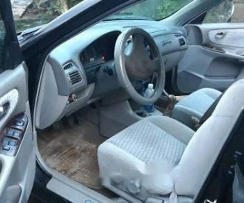 Mazda 626 2001 - Cần bán Mazda 626 đời 2001, màu đen, 210tr