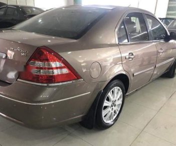 Ford Mondeo   2004 - Bán Ford Mondeo năm sản xuất 2004, màu vàng còn mới, 155 triệu