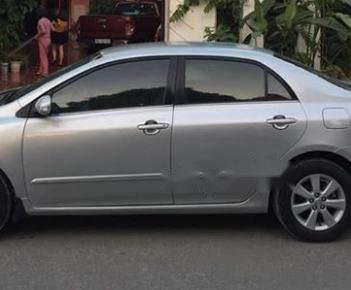 Toyota Corolla altis  1.8AT 2010 - Bán lại xe Toyota Corolla altis 1.8AT 2010, màu bạc, số tự động