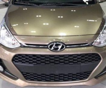 Hyundai Grand i10   2018 - Bán xe Hyundai Grand i10 sản xuất năm 2018, màu nâu giá cạnh tranh