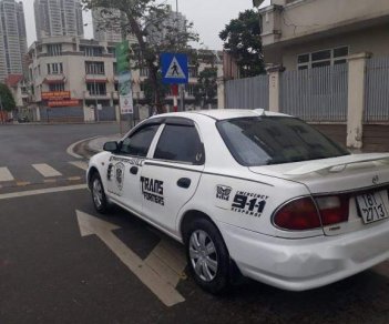 Mazda 323   2005 - Bán Mazda 323 năm sản xuất 2005, màu trắng, xe nhập