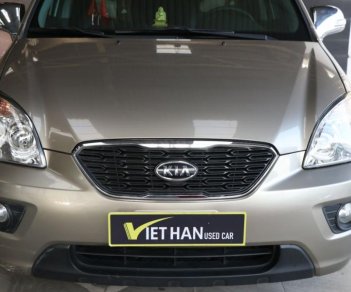 Kia Carens SX 2.0AT 2013 - Bán Kia Carens SX 2.0AT đời 2013, màu vàng