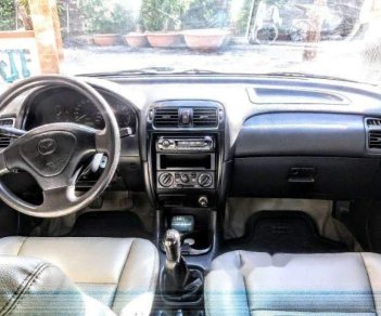 Mazda 626 2.0 1999 - Cần bán Mazda 626 2.0 đời 1999, màu trắng, nhập khẩu số sàn