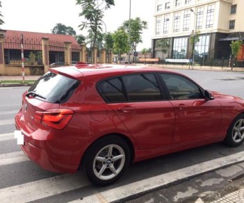 BMW 1 Series 118i 2015 - BMW 118i màu đỏ/đen sản xuất 2015, đăng ký 2016, nhập khẩu Đức, biển Hà Nội