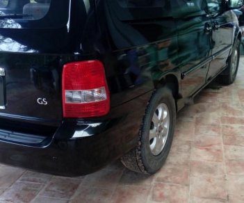 Kia Carnival GS 2.5 MT 2006 - Bán Kia Carnival GS 2.5 MT sản xuất 2006, màu đen, xe gia đình