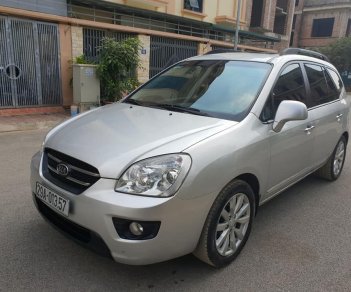 Kia Carens 2.0 2010 - Cần bán Kia Carens đời 2010, màu bạc