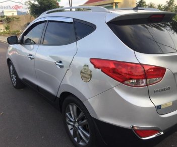 Hyundai Tucson 2.0 AT 4WD 2011 - Bán Hyundai Tucson 2.0 AT 4WD đời 2011, màu bạc, nhập khẩu, số tự động