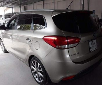 Kia Rondo  1.7MT  2015 - Bán ô tô Kia Rondo 1.7MT đời 2015, màu vàng