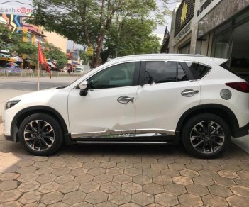 Mazda CX 5 2.0 AT 2016 - Cần bán gấp Mazda CX 5 2.0 AT 2016, màu trắng chính chủ, giá tốt