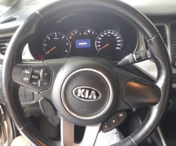 Kia Rondo  1.7MT  2015 - Bán ô tô Kia Rondo 1.7MT đời 2015, màu vàng