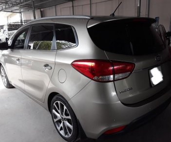 Kia Rondo DMT 2015 - Bán Kia Rondo DMT 2015, màu vàng cát, giá thương lượng, hỗ trợ góp