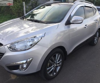 Hyundai Tucson 2.0 AT 4WD 2011 - Bán Hyundai Tucson 2.0 AT 4WD đời 2011, màu bạc, nhập khẩu, số tự động