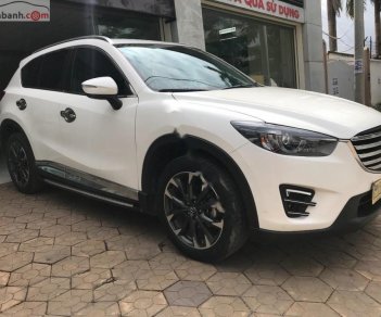 Mazda CX 5 2.0 AT 2016 - Cần bán gấp Mazda CX 5 2.0 AT 2016, màu trắng chính chủ, giá tốt