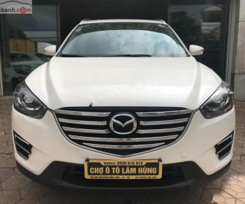 Mazda CX 5 2.0 AT 2016 - Cần bán gấp Mazda CX 5 2.0 AT 2016, màu trắng chính chủ, giá tốt