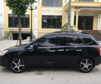 Kia Carens  1.6MT 2010 - Cần bán lại xe Kia Carens 1.6MT sản xuất 2010, màu đen số sàn