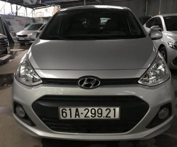 Hyundai Grand i10 1.0MT 2015 - Bán Hyundai i10 1.0MT màu bạc số sàn, nhập Ấn Độ 2015, bản 5 cửa, gia đình, xe chạy 38000km