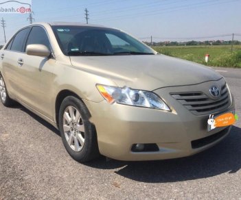 Toyota Camry 2.4 2007 - Bán Toyota Camry 2.4 sản xuất 2007, màu vàng, nhập khẩu nguyên chiếc chính chủ 