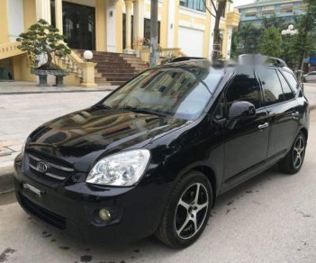 Kia Carens  1.6MT 2010 - Cần bán lại xe Kia Carens 1.6MT sản xuất 2010, màu đen số sàn