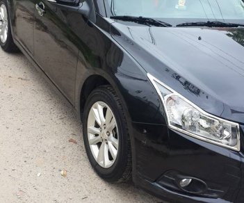 Chevrolet Cruze LS  2015 - Bán Cruze LS 2015, số sàn, màu đen huyền, phom cũ, cực đẹp