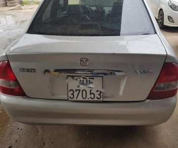 Mazda 323 2004 - Bán ô tô Mazda 323 2004, màu bạc như mới