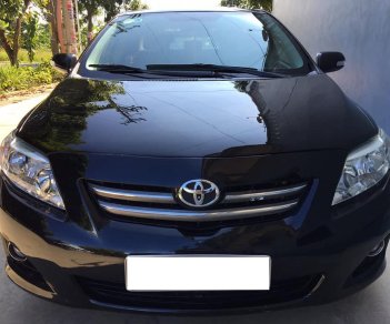 Toyota Corolla altis 2009 - Cần bán gấp Toyota Altis 2009, số sàn, màu đen cực xịn