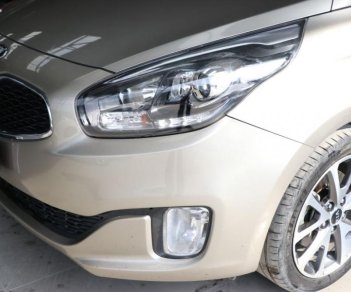 Kia Rondo 1.7MT 2015 - Bán xe Kia Rondo 1.7MT 2015, màu vàng, giá chỉ 548 triệu