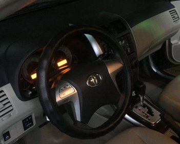 Toyota Corolla altis   1.8 AT  2014 - Bán Toyota Corolla altis 1.8 AT 2014, màu đen như mới