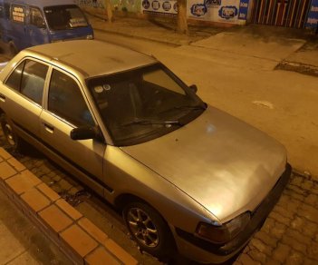 Mazda 323 1995 - Bán ô tô Mazda 323 đời 1995, màu trắng