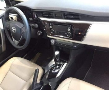 Toyota Corolla altis 1.8E CVT 2018 - Bán ô tô Toyota Corolla altis 1.8E CVT đời 2018, màu trắng giá cạnh tranh