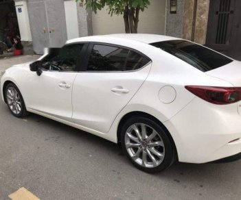 Mazda 3 2.0AT 2016 - Cần bán gấp Mazda 3 2.0AT 2016, màu trắng như mới