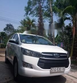 Toyota Innova MT 2018 - Cần bán Innova Đk 26/12/2017, số sàn, có đăng ký Grab nhưng không chạy