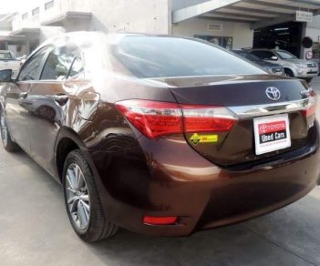 Toyota Corolla altis 2017 - Cần bán gấp Toyota Corolla altis đời 2017, màu nâu chính chủ