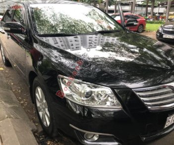 Toyota Camry 2.4G 2009 - Bán ô tô Toyota Camry 2.4G sản xuất năm 2009, màu đen, giá 590tr