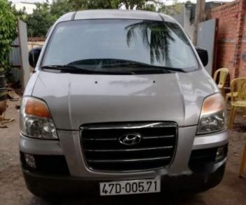 Hyundai Starex  MT 2006 - Cần bán lại xe Hyundai Starex MT 2006, màu bạc, xe còn rất tốt, nhà ít đi