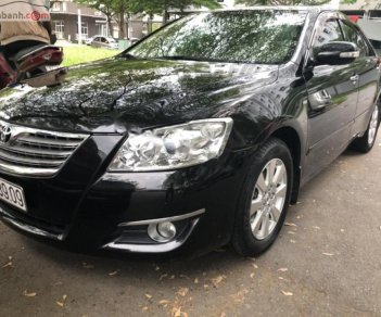 Toyota Camry 2.4G 2009 - Bán ô tô Toyota Camry 2.4G sản xuất năm 2009, màu đen, giá 590tr