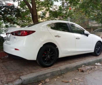 Mazda 3 1.6AT 2016 - Cần bán gấp Mazda 3 1.6AT 2016, màu trắng chính chủ giá cạnh tranh