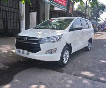 Toyota Innova MT 2018 - Cần bán Innova Đk 26/12/2017, số sàn, có đăng ký Grab nhưng không chạy