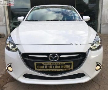 Mazda 2 1.5 AT 2016 - Cần bán gấp Mazda 2 1.5 AT sản xuất 2016, màu trắng chính chủ 