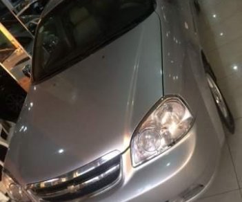 Chevrolet Lacetti 2012 - Bán Chevrolet Lacetti đời 2012, màu bạc xe gia đình