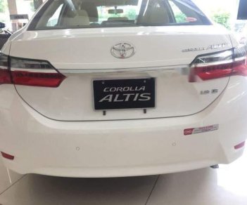 Toyota Corolla altis  1.8E   2018 - Bán ô tô Toyota Corolla altis 1.8E đời 2018, màu trắng, 718tr