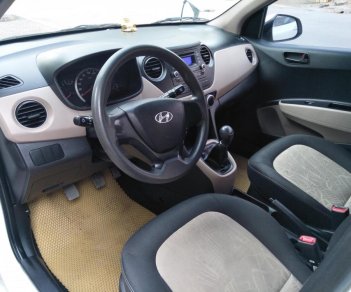 Hyundai Grand i10 MT 2015 - Cần bán xe Hyundai Grand i10 MT năm sản xuất 2015, màu trắng, nhập khẩu nguyên chiếc